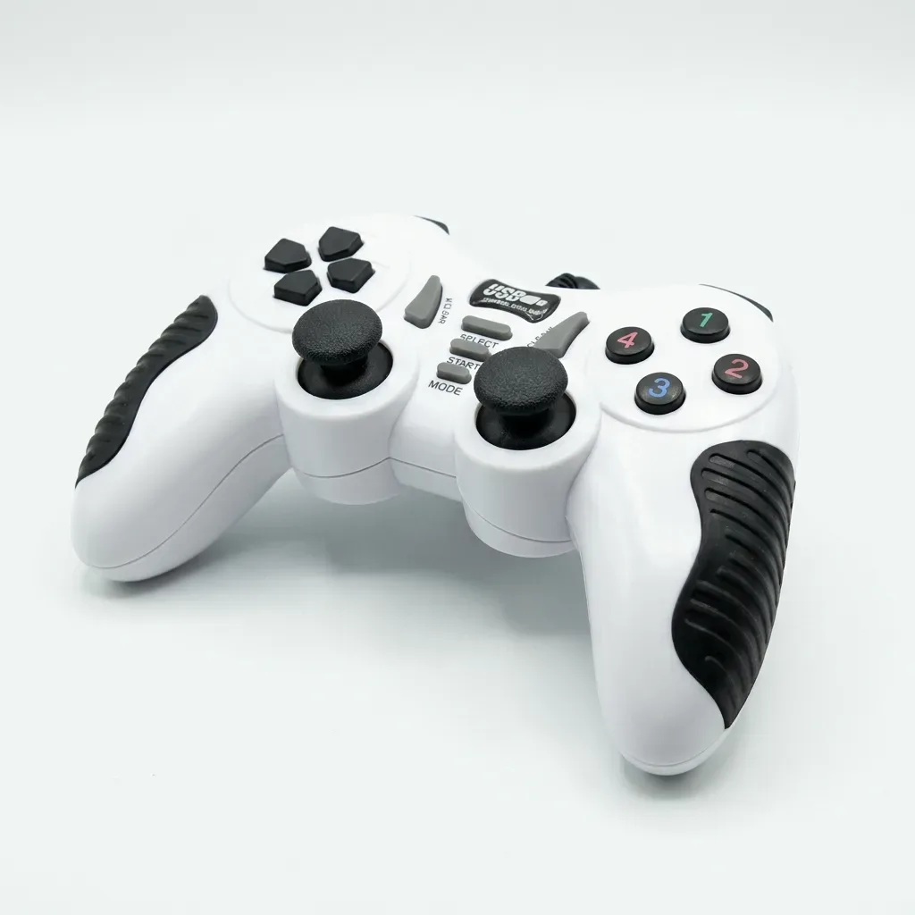 White game controller with two black thumbsticks, directional buttons, numbered action buttons and dark textured grips.