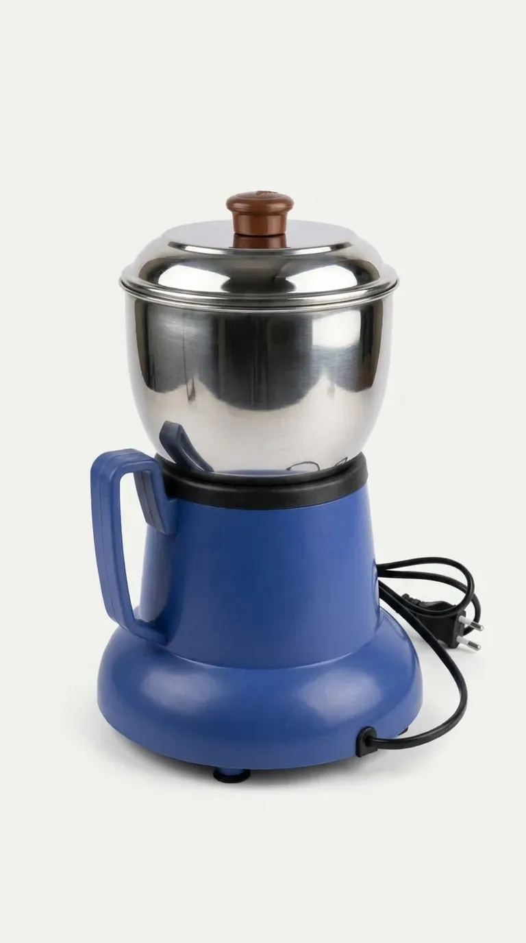 Compact blue electric mixer grinder featuring a stainless steel jar with lid, side handle and wired motor base on a white background.