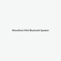 Compact Bluetooth speaker on a neutral studio background